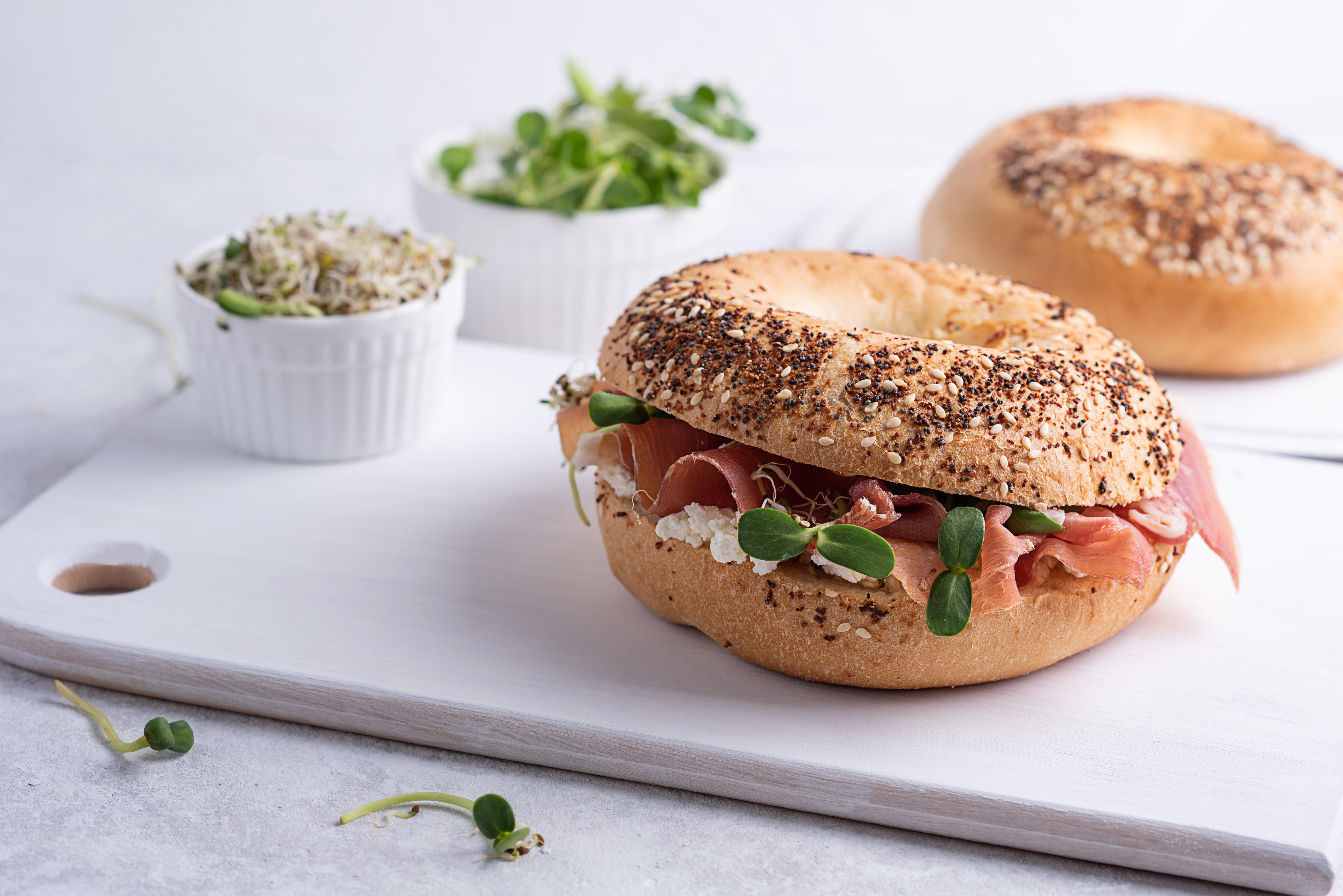 bagel with ricotta and microgreens